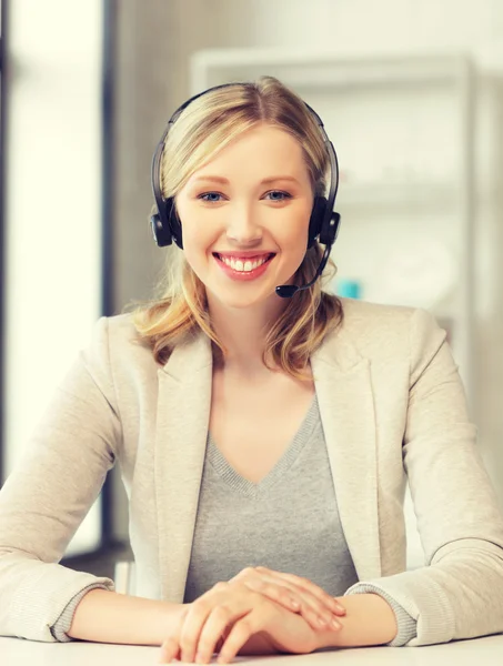 Friendly female helpline operator — Stock Photo, Image