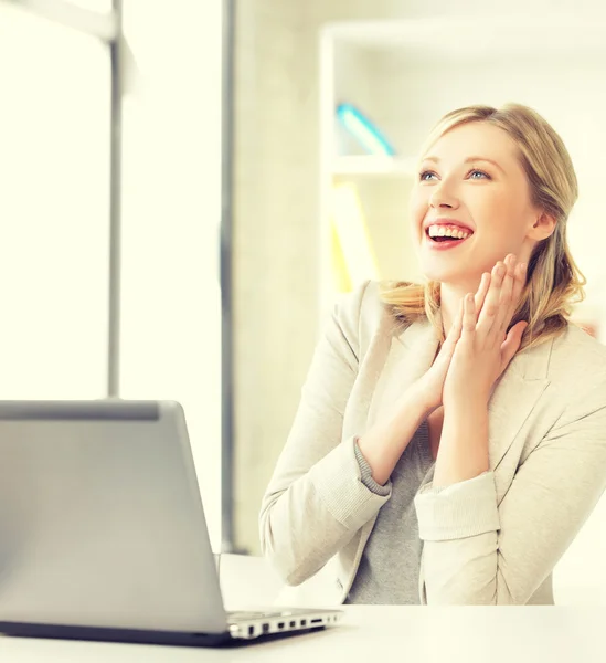 Happy woman with laptop computer — Stock Photo, Image