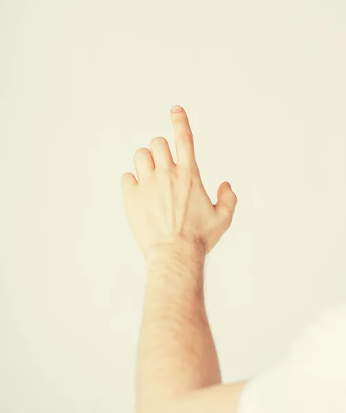 Man hand pointing at something — Stock Photo, Image
