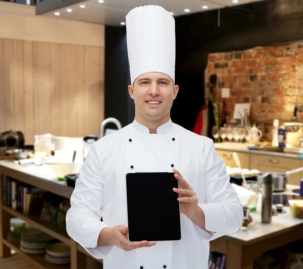 Felice cuoco maschio cuoco mostrando tablet pc — Foto Stock