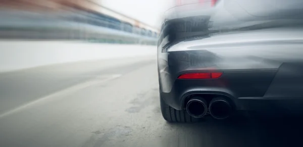 Close up of car riding on highway from back — Stock Photo, Image