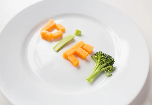 Närbild på plattan med vegetabilisk diet bokstäver — Stockfoto