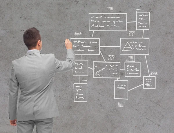 Geschäftsmann Schema schreiben oder zeichnen — Stockfoto