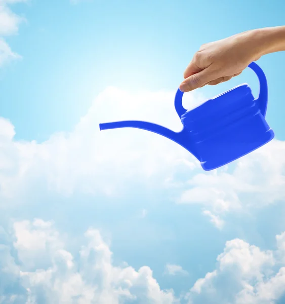 Close up of woman hand holding watering can — Stock Photo, Image