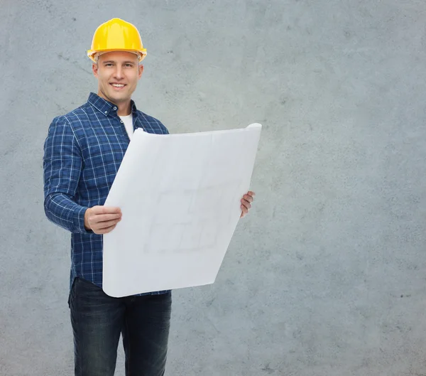 Усміхнений чоловік-будівельник в шоломі з відбитками — стокове фото