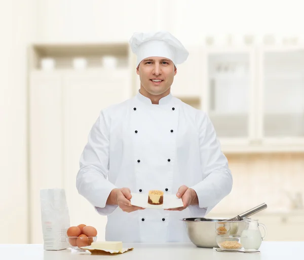 Happy male chef cook baking — Stock Photo, Image