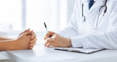 patient and doctor taking notes clipart