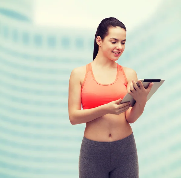 Mulher desportiva com computador tablet pc — Fotografia de Stock