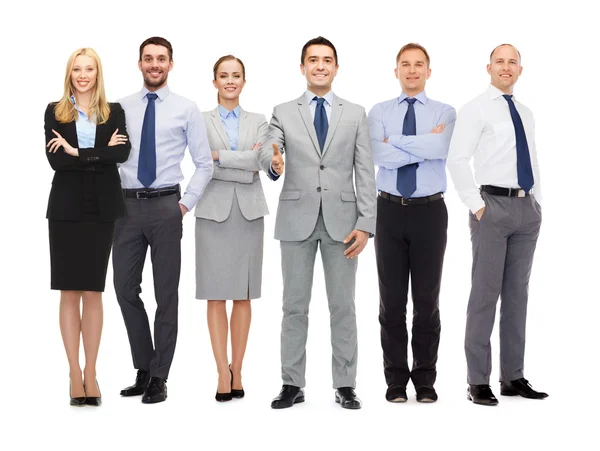 Group of smiling businessmen making handshake — Stock Photo, Image