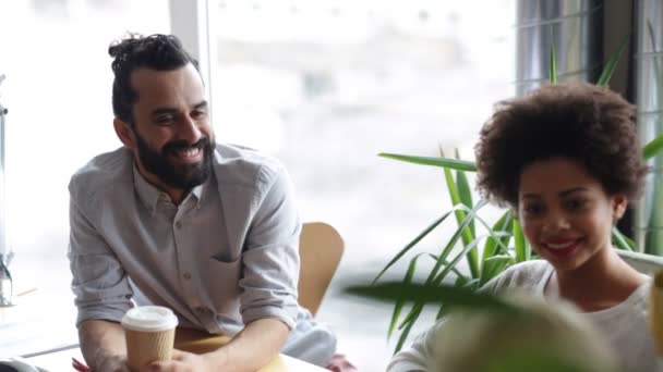 Happy creative team with coffee talking in office — Stock Video