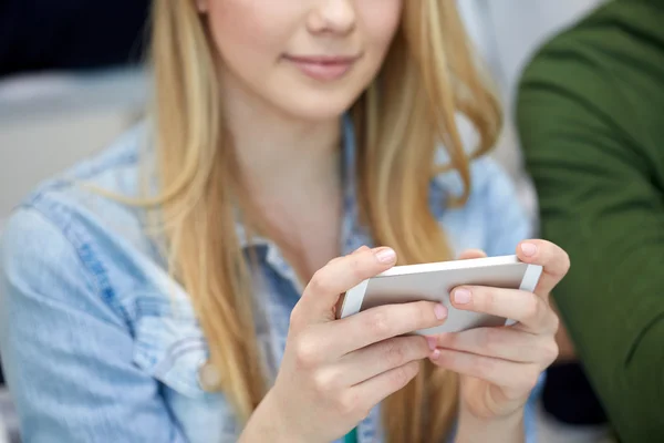 Close up of female hands with smartphone — Stock Photo, Image