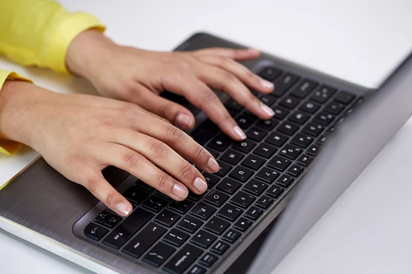 Close up of female hands with laptop typing — Stock Photo, Image