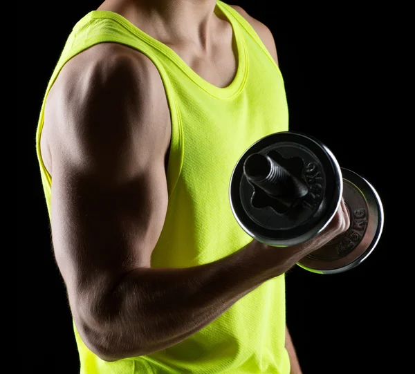 Close up of young man with dumbbell — Stock Photo, Image
