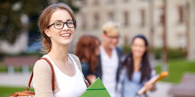 happy teenage students with school folders clipart