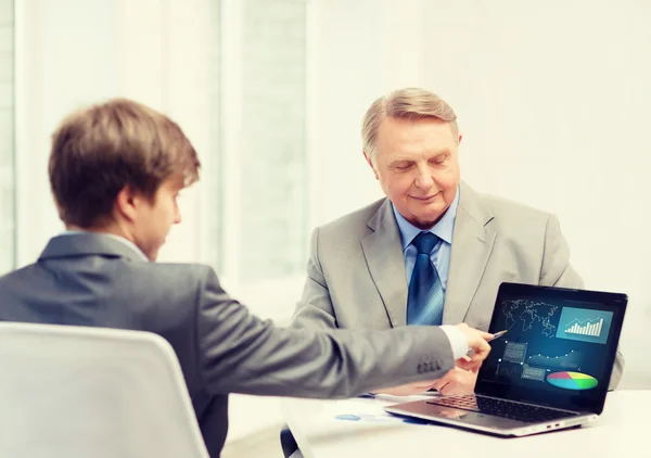 Older man and young man with laptop computer — Stock Photo, Image