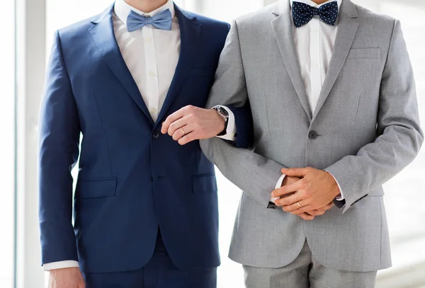 Close up of happy male gay couple holding hands — Stock Photo, Image