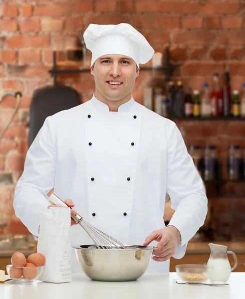 Happy male chef cook baking — Stock Photo, Image