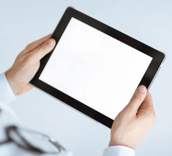 Male doctor holding tablet pc — Stock Photo, Image