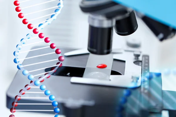 Close up of microscope and blood sample in lab — Stock Photo, Image