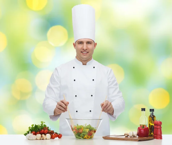 Happy male chef cook cooking food — Stock Photo, Image