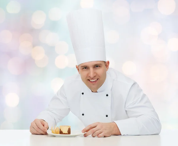 Happy male chef cook with dessert — Stock Photo, Image