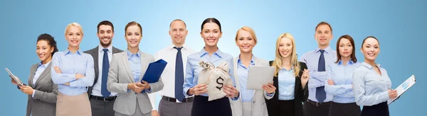 Group of happy businesspeople with money bags — Stock Photo, Image