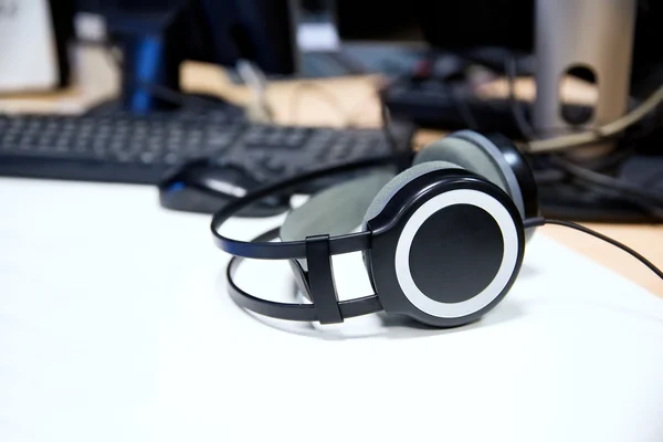 Headphones at recording studio or radio station — Stock Photo, Image