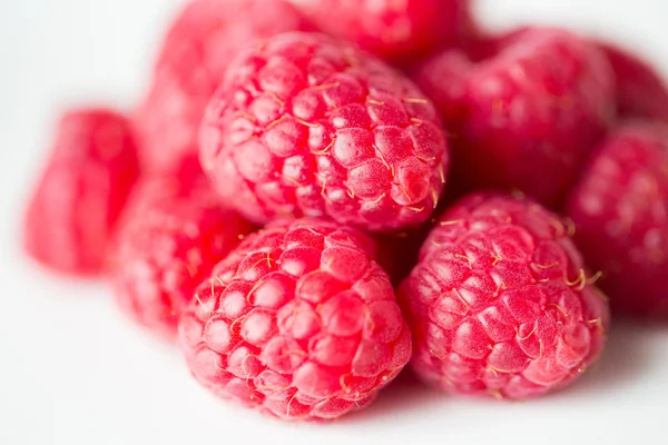 Juicy fresh ripe red raspberries on white — Stock Photo, Image