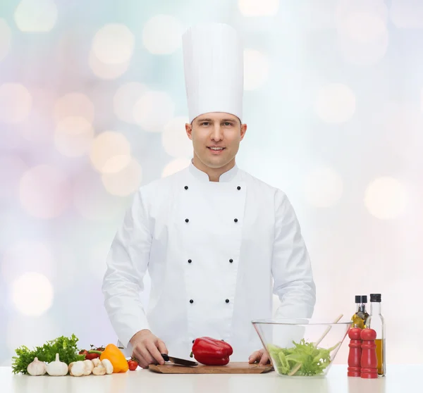 Gelukkig mannelijke chef-kok koken voedsel koken — Stockfoto