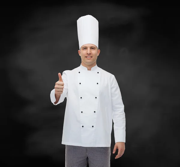 Gelukkig mannelijke chef kok duimen opdagen — Stockfoto