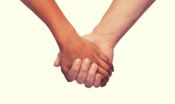 Woman and man holding hands — Stock Photo, Image