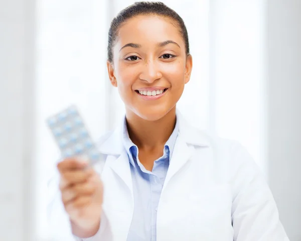 Doctor with blister packs of pills — Stock Photo, Image