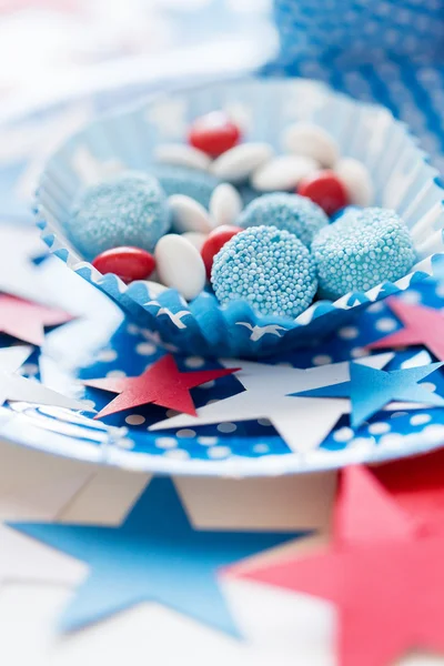 Snoepjes met sterren decoratie op independence day — Stockfoto