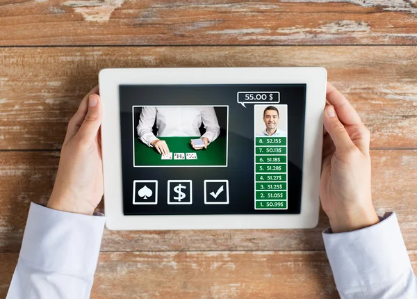 Close up of female hands with tablet pc on table — Stock Photo, Image