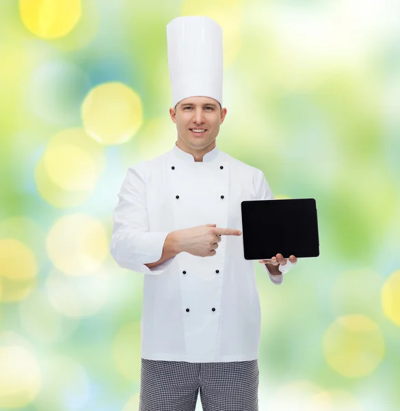 Cozinheiro chef masculino feliz mostrando com tablet pc — Fotografia de Stock