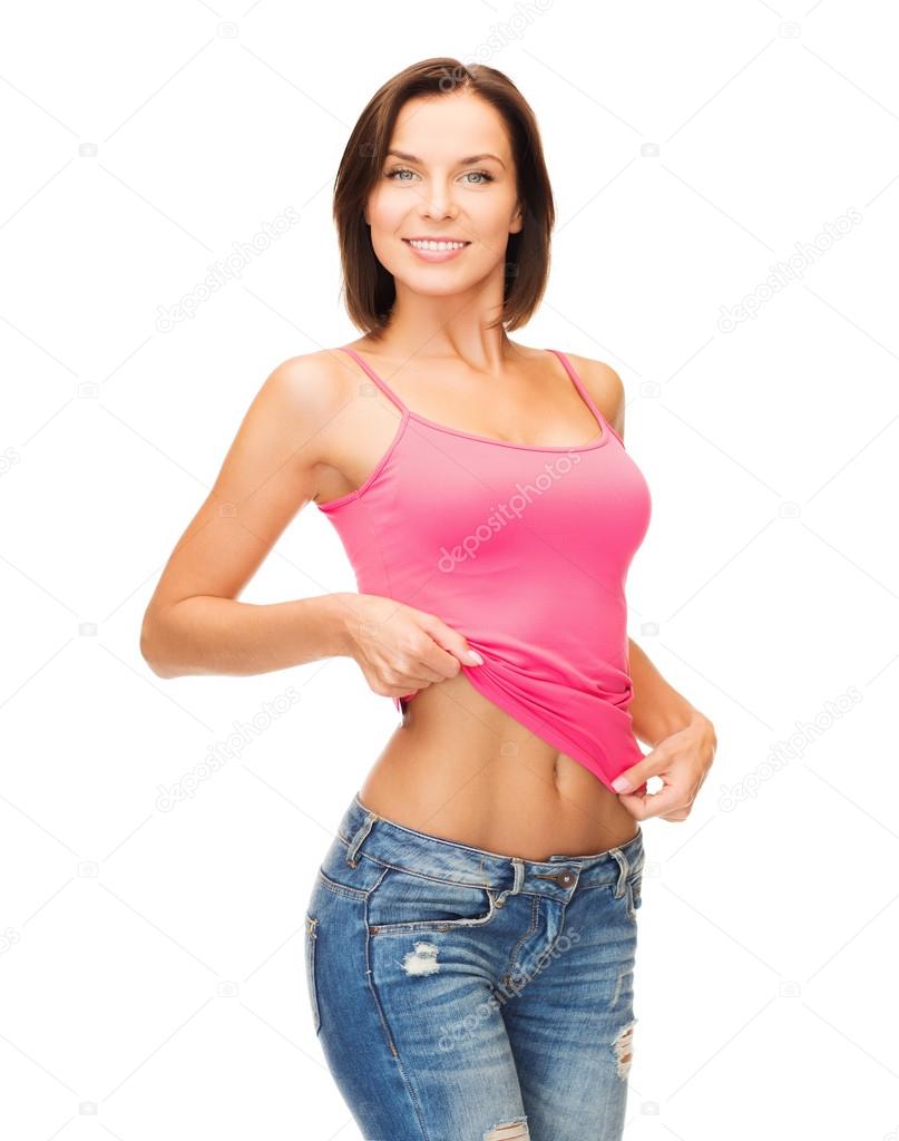 Woman showing abs Stock Photo by ©Syda_Productions 75203569