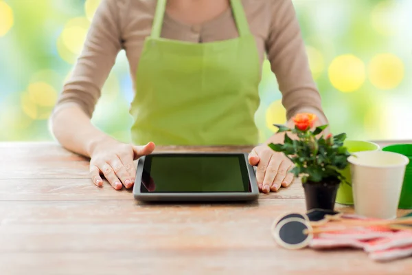 Close up of woman or gardener with tablet pc — Stok Foto