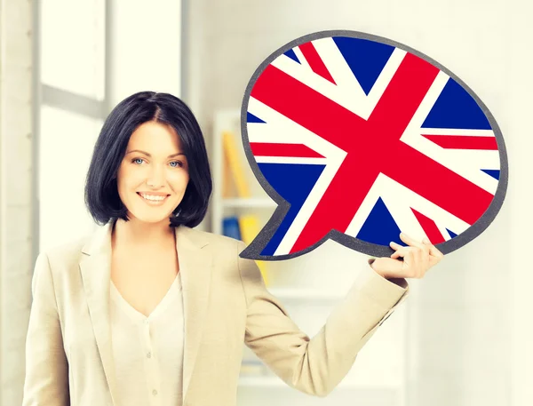 Mulher sorridente com bolha de texto de bandeira britânica — Fotografia de Stock