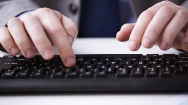 Close up of businessman hands typing on keyboard — Stock Video