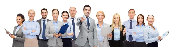 Group of happy business people pointing at you — Stock Photo, Image