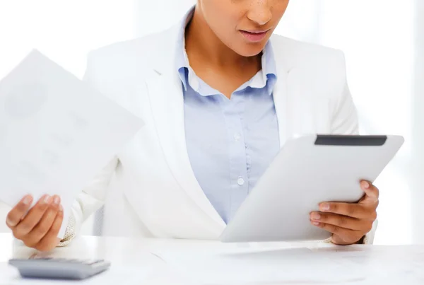 Businesswoman with tablet pc in office — Stock Photo, Image
