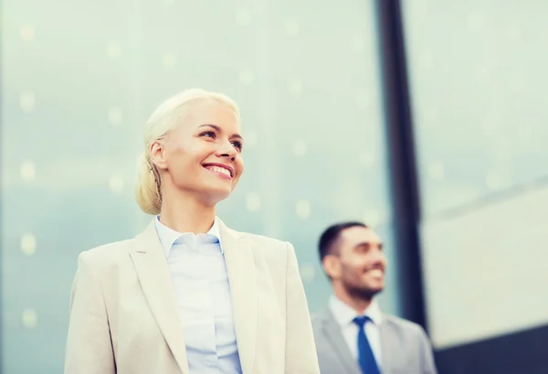 Close up of smiling businessmen — Stock Photo, Image