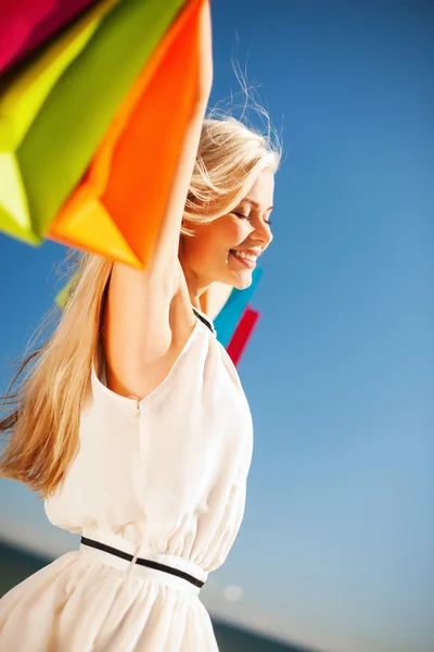 Woman with shopping bags — Stock Photo, Image