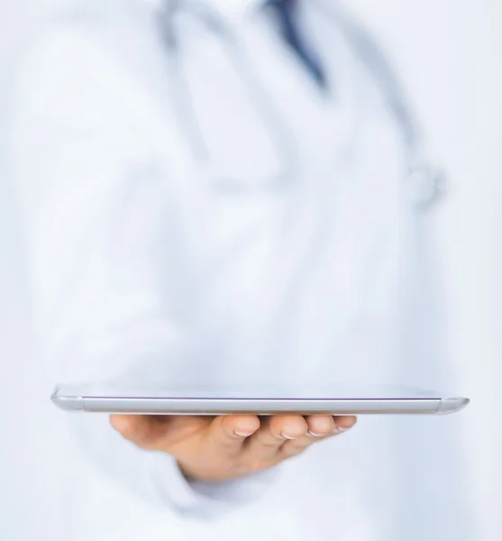 Male doctor holding tablet pc — Stock Photo, Image