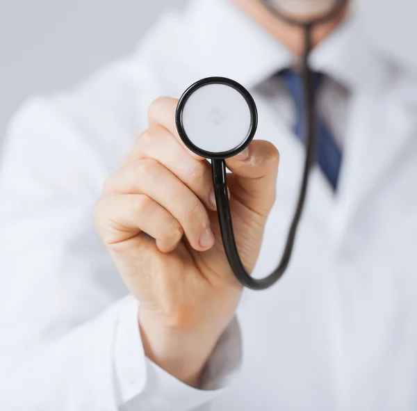 Doctor hand with stethoscope listening something — Stock Photo, Image