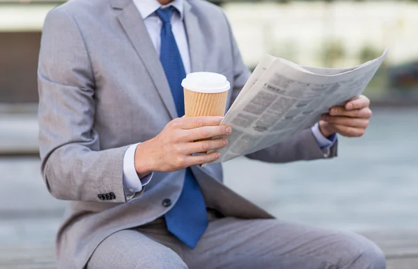 Close up of businessman reading newspaper — Stock Photo, Image