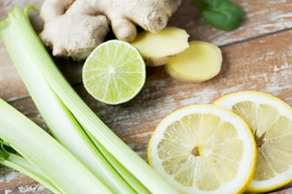 Close up of ginger, celery and lemon on table — Φωτογραφία Αρχείου