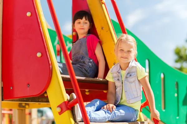 Happy kids on children playground — Stock Photo, Image