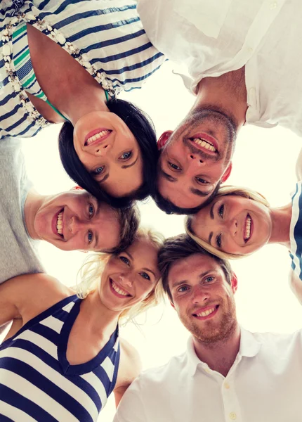Smiling friends in circle — Stock Photo, Image