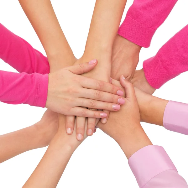 Close up of women with hands on top — Stock Photo, Image